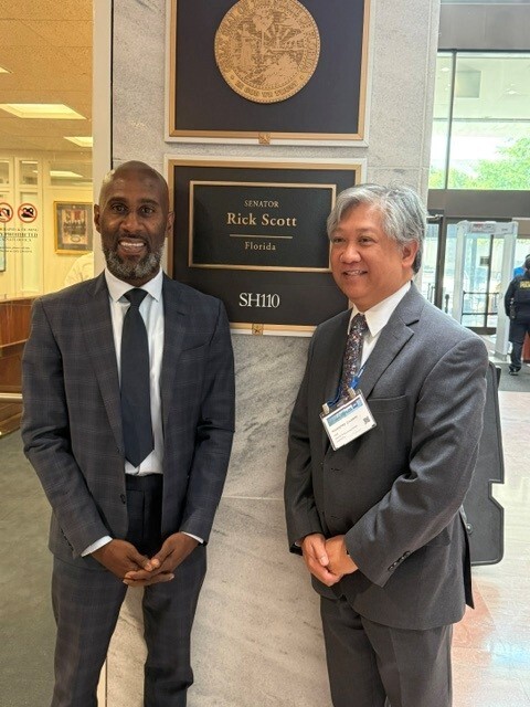 Travaris McCurdy of Orlando Housing Authority and Kris Cruzada of Seminole County Housing Authority.