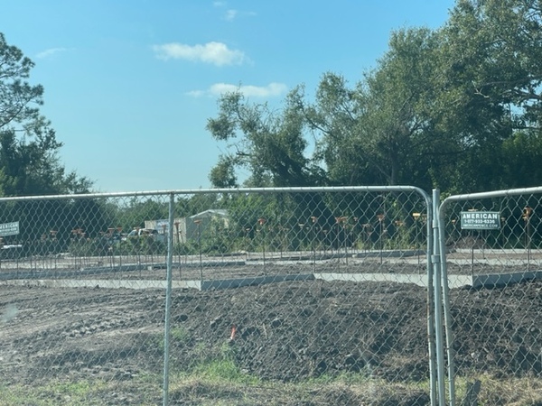 Beginning to lay the foundation on the construction site.