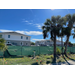 Outside view of Cypress Gardens Development over a fence.