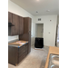 Internal photo of a partially-completed kitchen. 