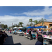 A street view of multiple tents set up.