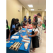 A group of children painting.