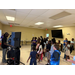  A room full of kids and a DJ. 