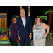  Becky-Sue standing next to a man and a woman smiling for a photo. 