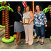  Becky-Sue standing with two other women holding an award. 